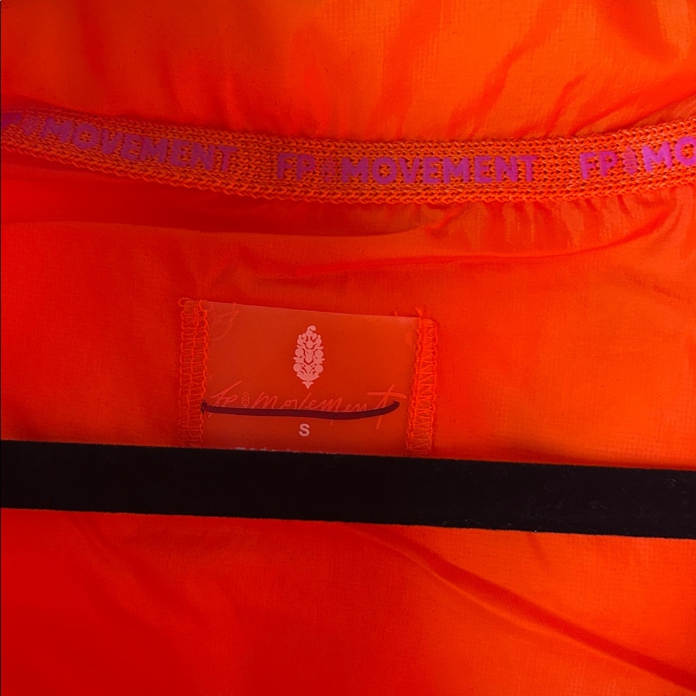 Free People Movement in a bubble Bright Orange Puffer Vest - Picture 6 of 7